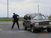 Officer Pepper investigates a motor vehicle accident