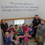 Officer Brennum and Officer Pepper give a tour of the Police Department